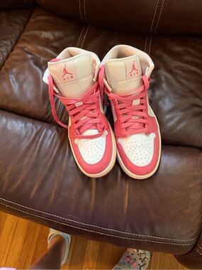 Jordan women’s  Pink and White High-Top Sneakers